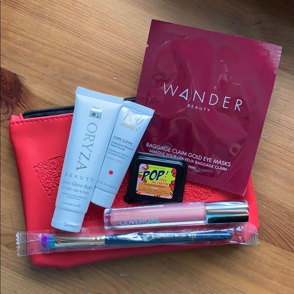 Ipsy glam bag and 6 makeup items
